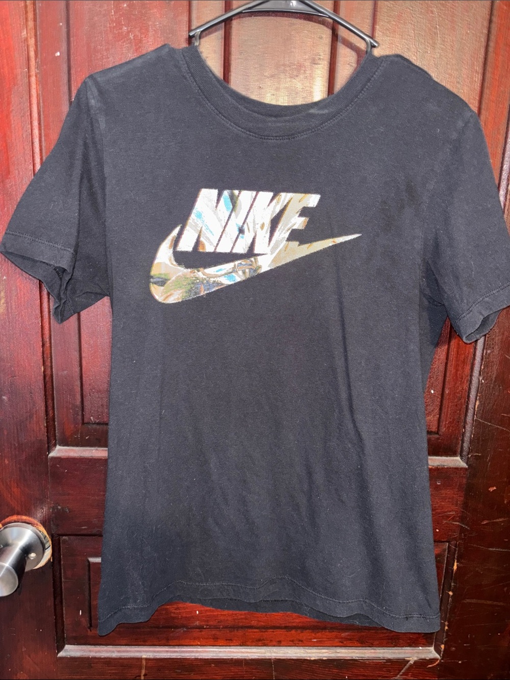 Nike Black Tee with Multicolor Patterned Logo